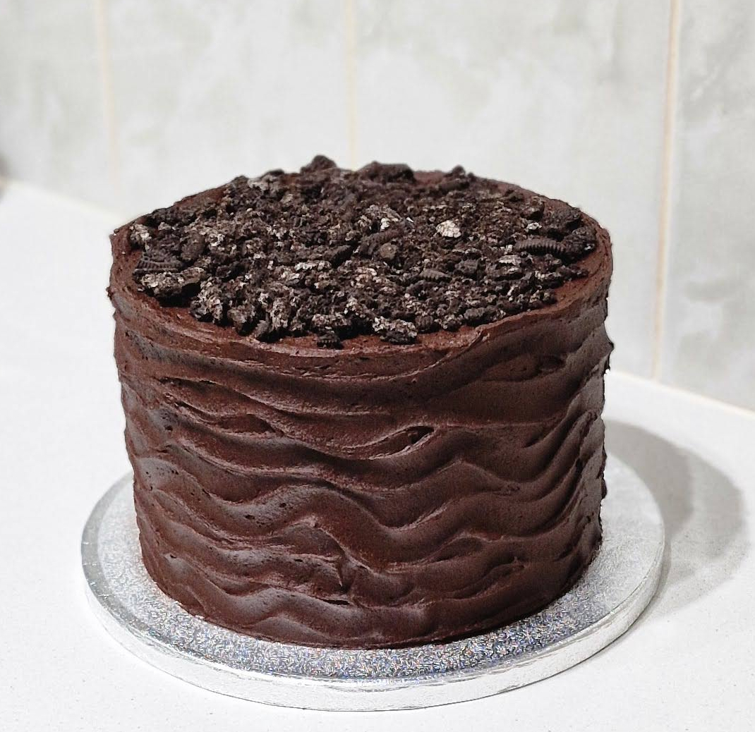 Rich textured gourmet double chocolate Oreo cookie crumb birthday cake